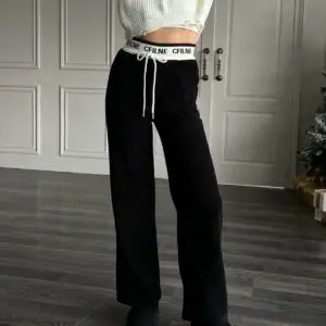 CELINE Low Waist Stitch Pants