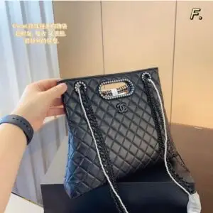 CHANEL Pearl Embellished Lambskin Handbag