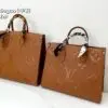 Louis Vuitton Empreinte Leather Handbag