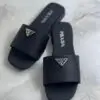 PRADA Plaque Brushed Leather Slides