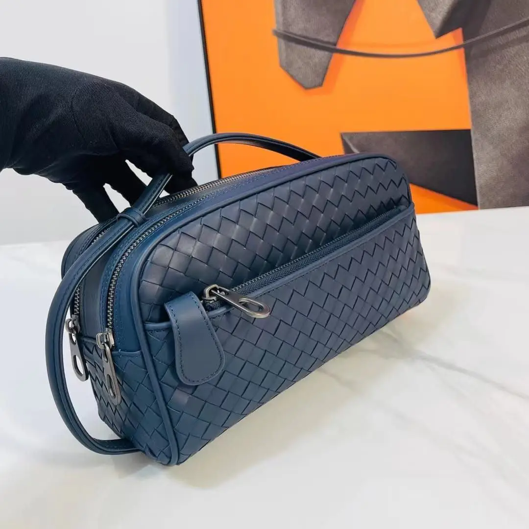 Bottega Veneta Intrecciato Leather Clutch Bottega Veneta Intrecciato Leather Clutch