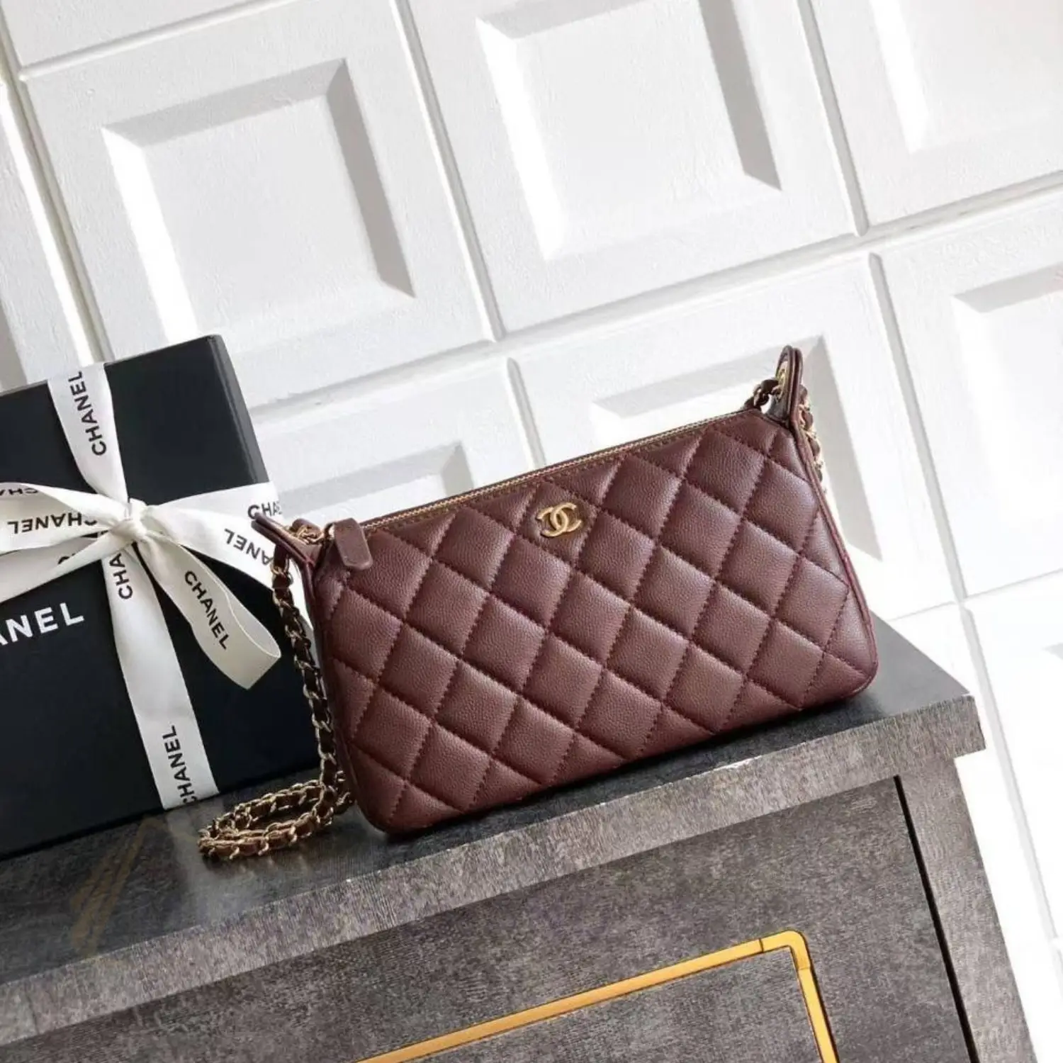 CHANEL Gold Ball Mini Case Lambskin Crossbody Bag CHANEL Gold Ball Mini Case Lambskin Crossbody Bag