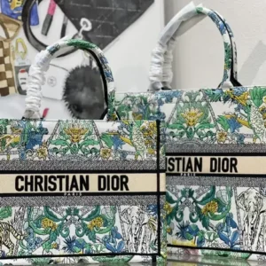 Introduced by Maria Grazia Chiuri , the Book Tote has become a staple of the aesthetic. Designed to hold all the daily essentials, the style is fully embroidered with the ecru...