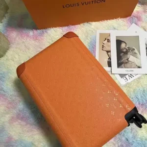 LV Orange Rolling Luggage